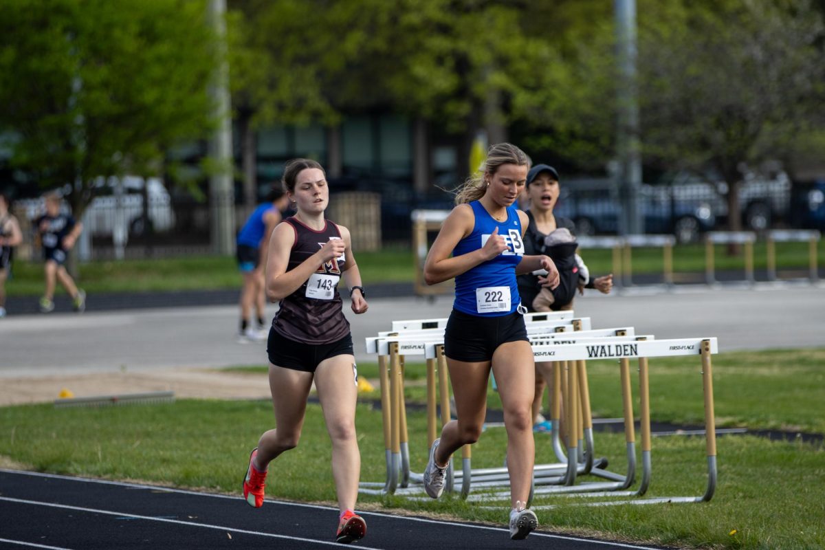 Wesley Drake running the girls 1600m