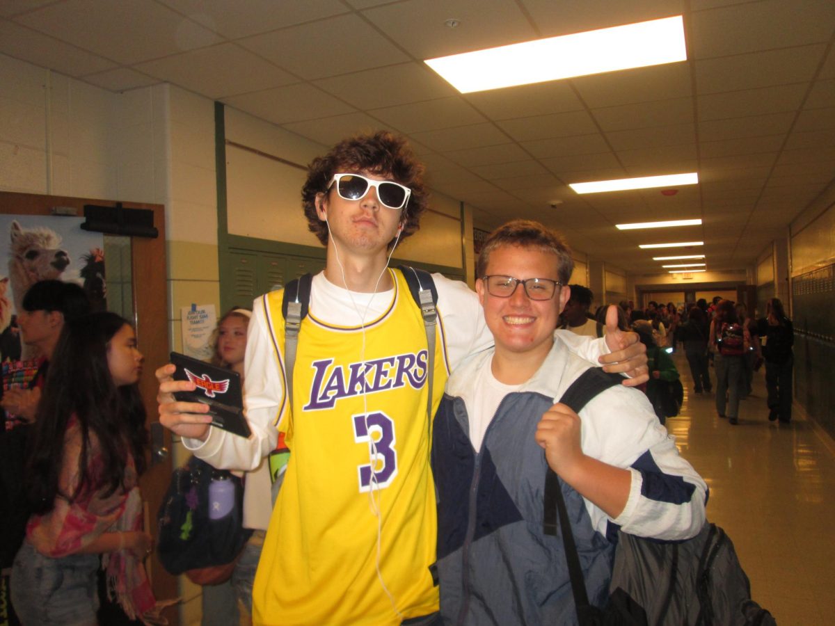 Wesley Buchanan (12) and Jackson Riddle (11) posing for a photo on Decades day.