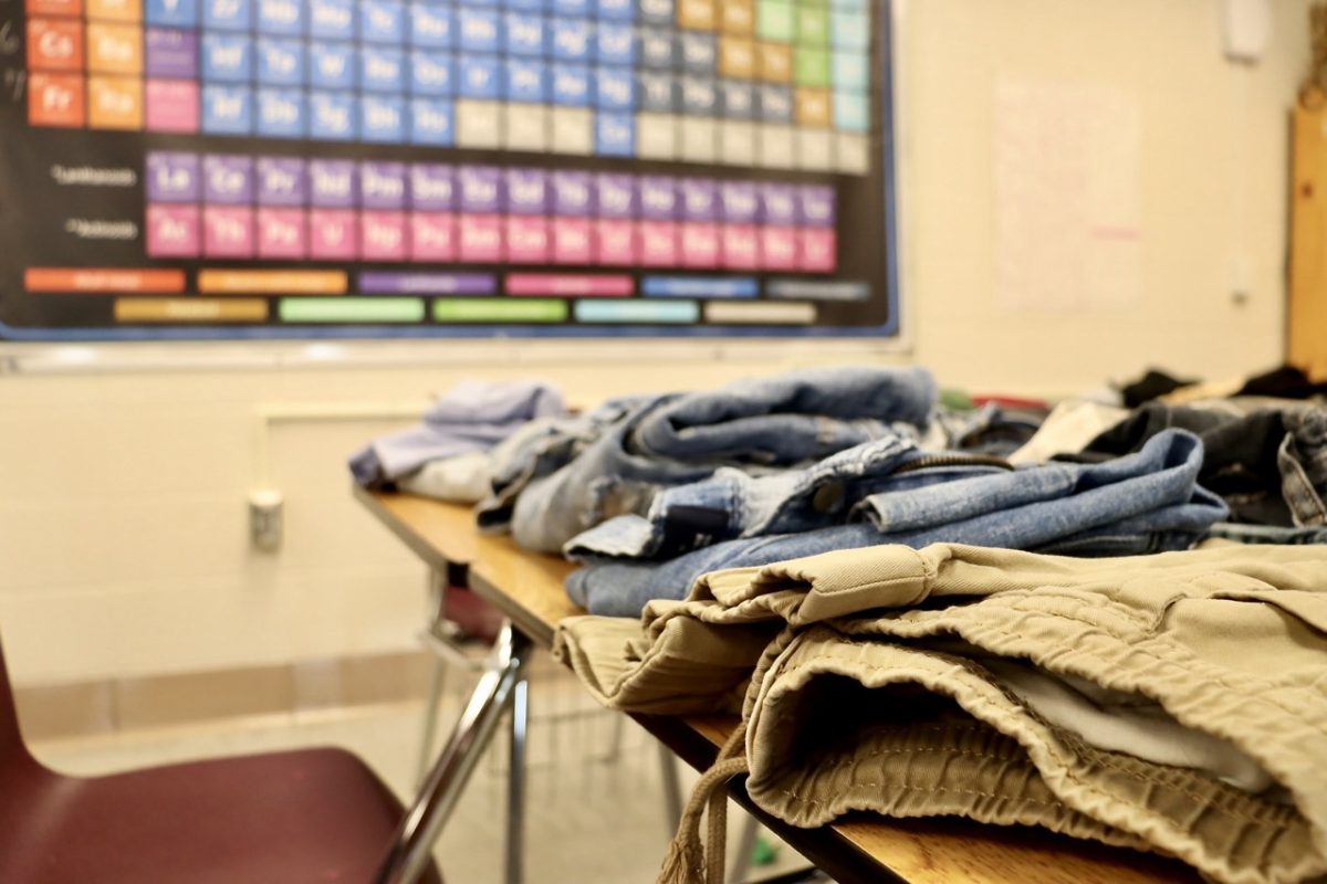 Table of donated pants arranged for students' convenience. 