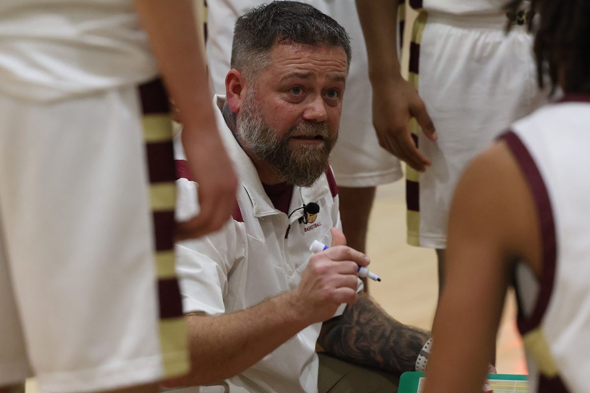 Coach Tudor giving advice.