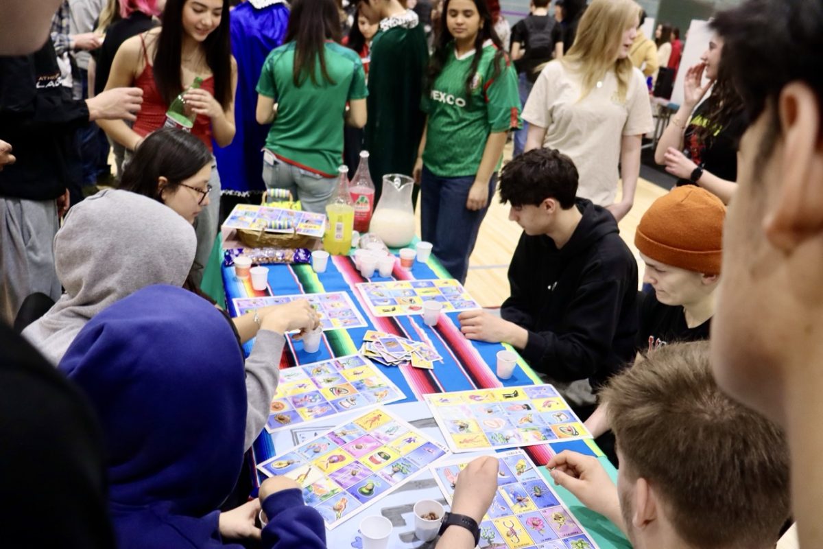 Students playing Lotería Mexicana, a Mexican card game similar to bingo. 